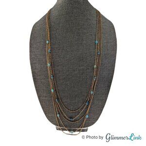Layered Multi Chain Blue Faceted Crystal Stations Gold Tone Necklace